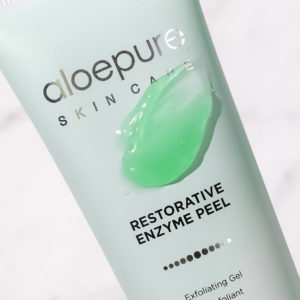 Restorative Enzyme Peel with swatch on bottle 1080x1080 1